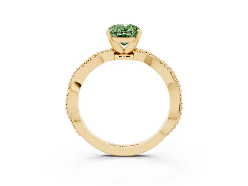 Fancy Green Oval Cut Diamond Solitaire Ring Set in Yellow gold with Twisted Band and Bead Prong Setting