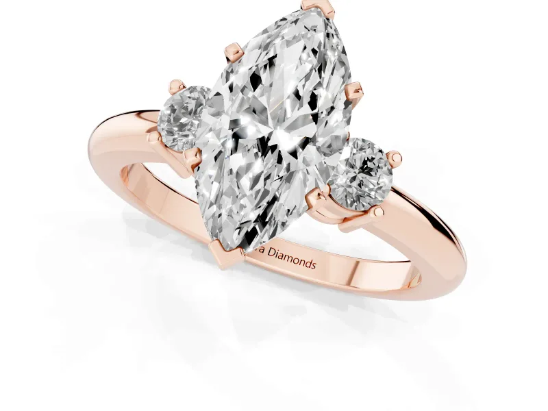 Three-Stone Marquise Cut Diamond Ring Set in Rose gold with Prong Setting and Plain Band