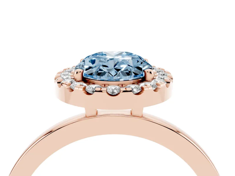 Fancy Blue Oval Cut Diamond Halo Solitaire Ring Set in Rose gold with Pavé Band and Prong Setting