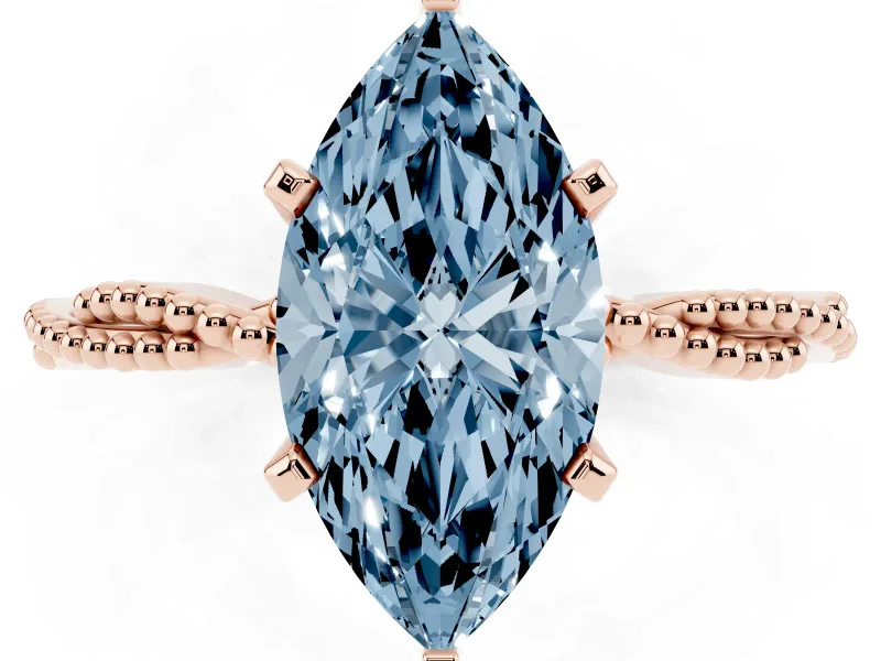 Fancy Blue Marquise Cut Diamond Solitaire Ring Set in Rose gold with Twisted Band and Bead Prong Setting