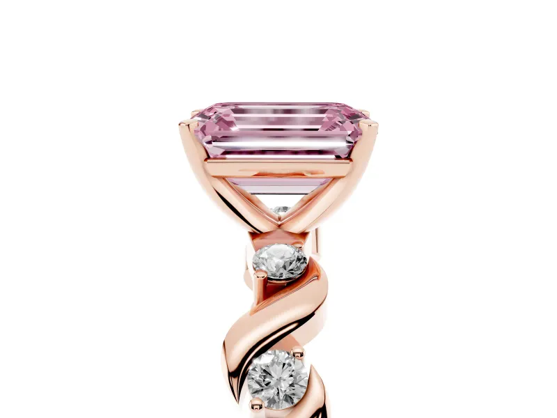 Fancy Pink Emerald Cut Diamond Solitaire Ring Set in Rose gold with Ribbon Twist Band, Round Accents and Prong Setting