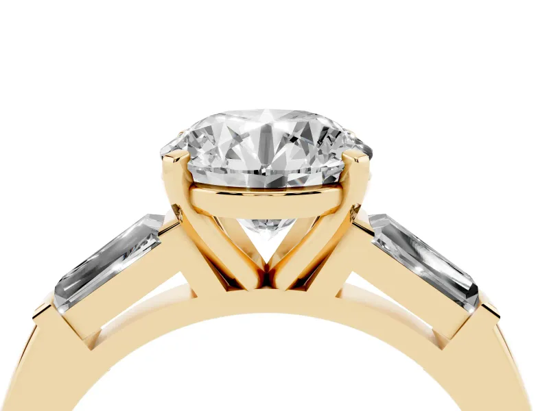 Round Cut Diamond Solitaire Ring Set in Yellow gold with Tapered Baguette Side Stones and Prong Setting