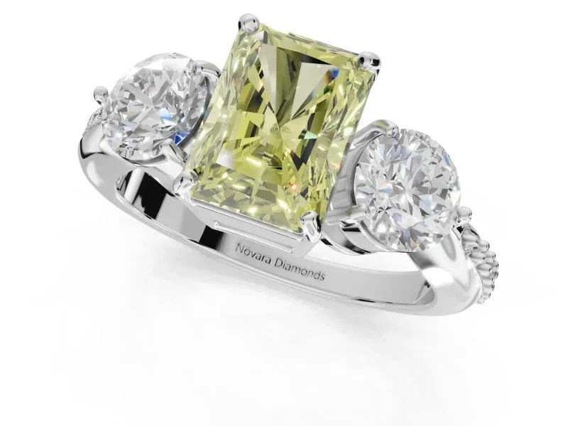 Radiant Cut Three Stone Engagement Ring Setting for a Fancy Yellow Lab-Grown Diamond | Tapered Pave Band | Platinum