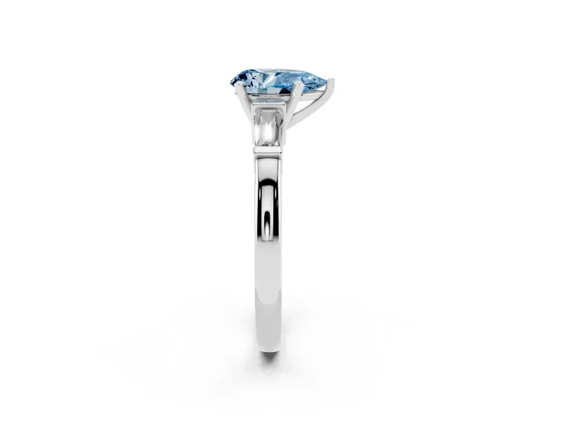 Fancy Blue Pear Cut Diamond Solitaire Ring Set in White gold with Tapered Baguette Accents and Prong Setting