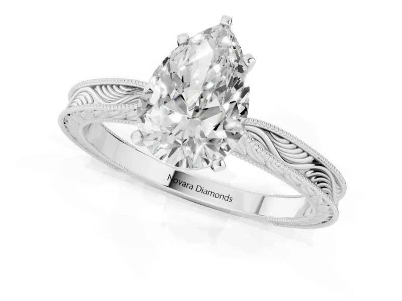 Pear Cut Diamond Solitaire Milgrain Engraved Band Set in Silver with Prong Setting