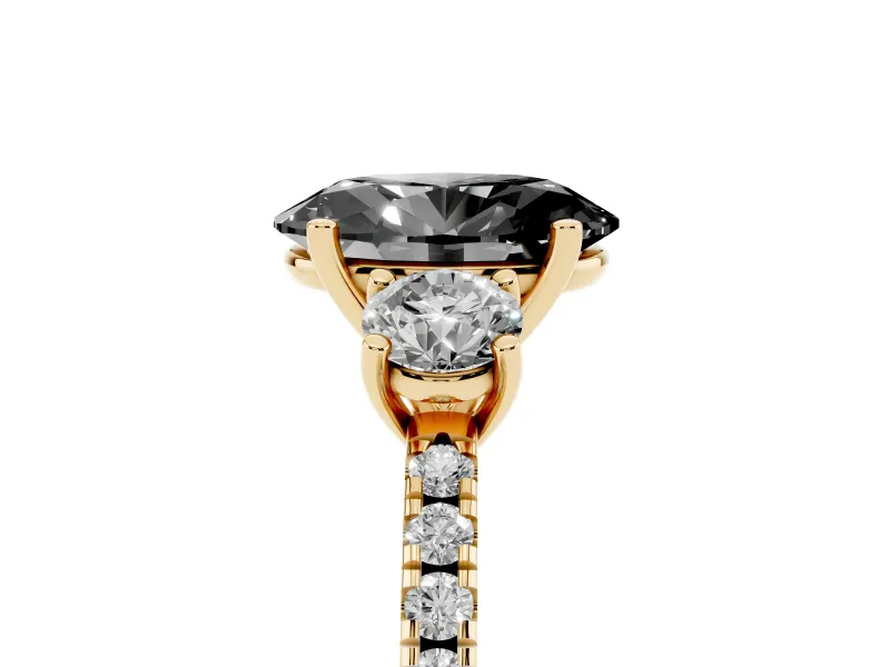 Fancy Black Oval Cut Diamond Three-Stone Ring Set in Yellow gold with Pavé Band and Graduated Sides