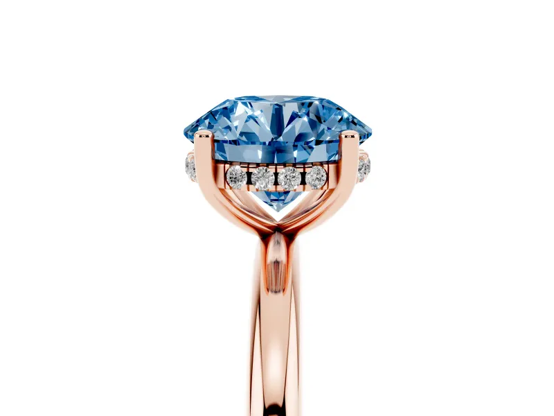 Fancy Blue Round Cut Diamond Solitaire Engagement Ring Set in Rose gold with Prong Setting and Polished Band