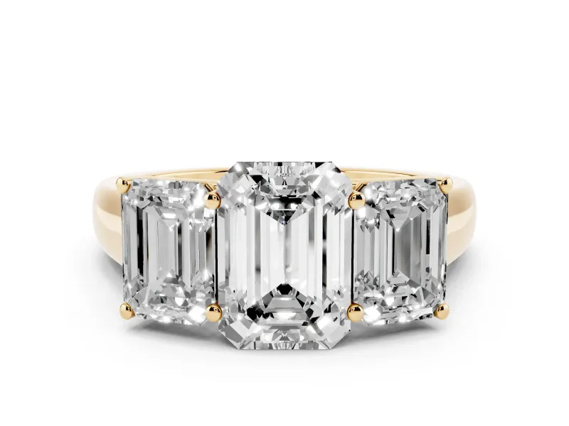 Emerald Cut Diamond Three-Stone Ring Set in Yellow gold with Plain Polished Band