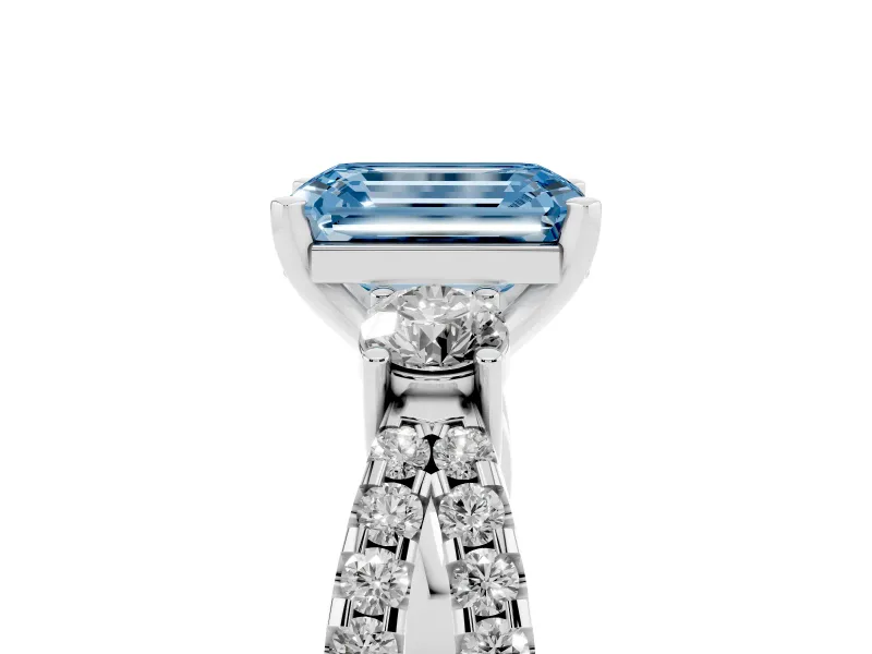 Fancy Blue Emerald Cut Diamond Three-Stone Ring Set in Platinum with Pavé Split Shank and Prong Setting