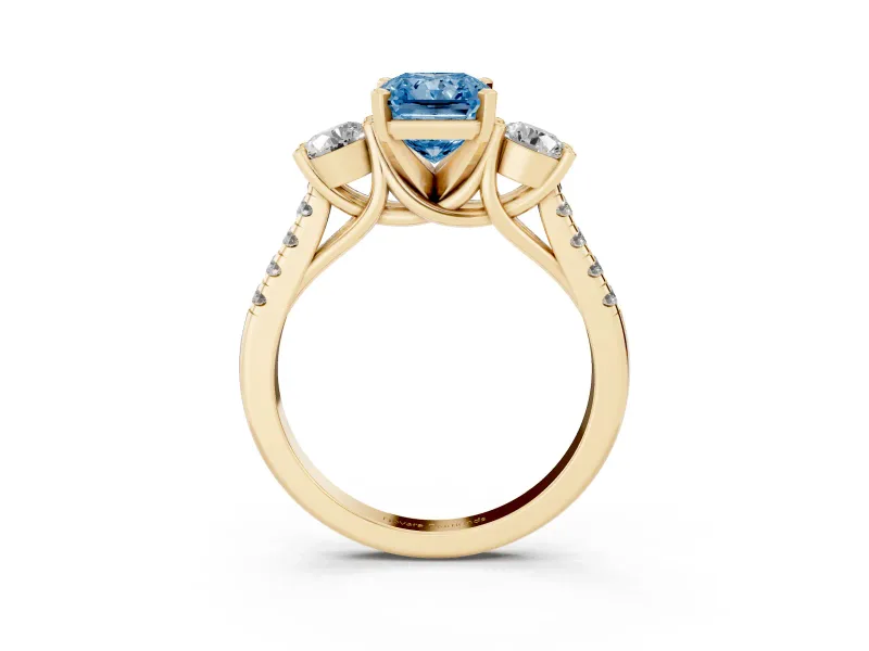 Fancy Blue Three-Stone Radiant Cut Diamond Pavé Band Ring Set in Yellow gold with Prong-Set Trio
