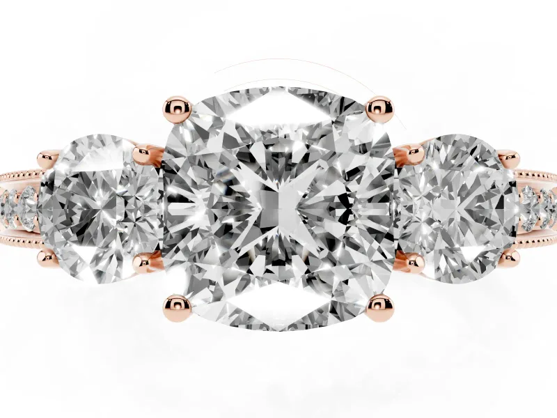 Cushion Cut Diamond Three-Stone Ring Set in Rose gold with Round Side Stones and Pavé Band