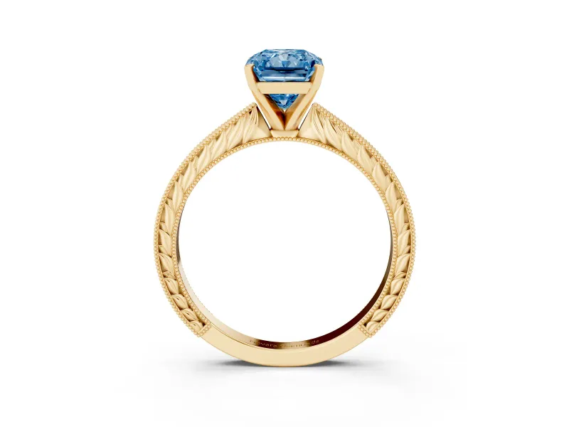 Fancy Blue Radiant Cut Diamond Solitaire Milgrain Engraved Band Set in Yellow gold with Prong Setting