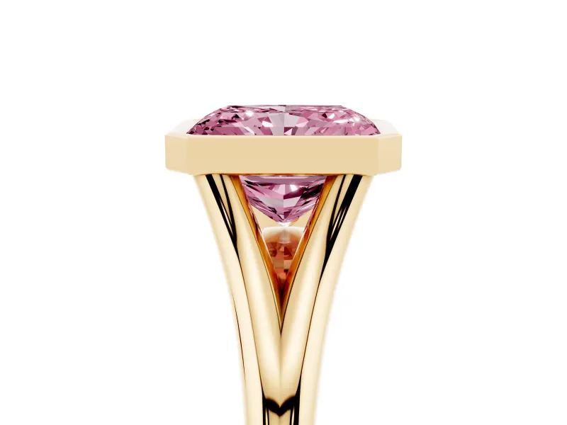 Fancy Pink Bezel Set Radiant Cut Diamond Solitaire Ring Set in Yellow gold with Tapered Band