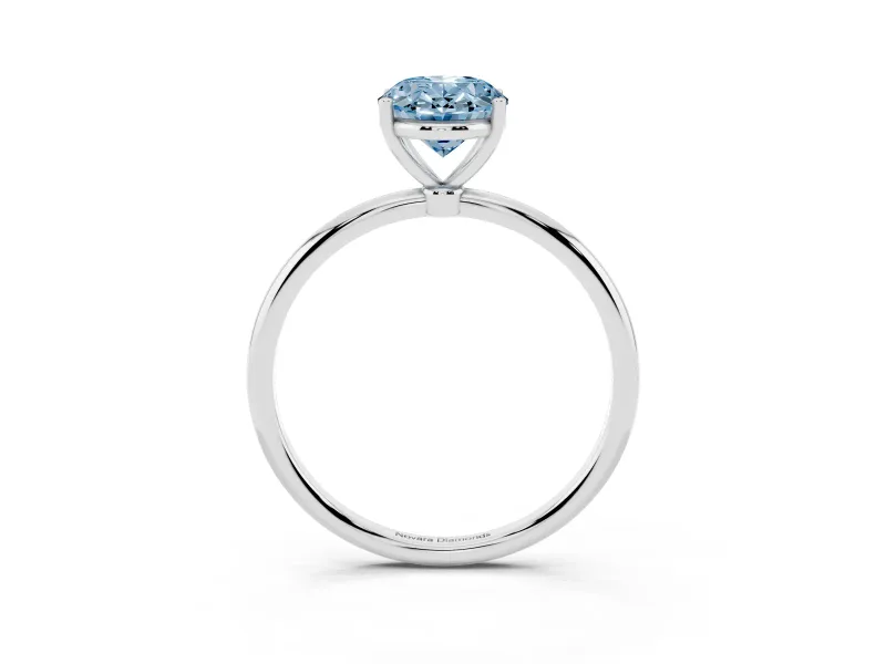 Fancy Blue Oval Cut Diamond Solitaire Engagement Ring Set in White gold with Thin Band and Prong Setting