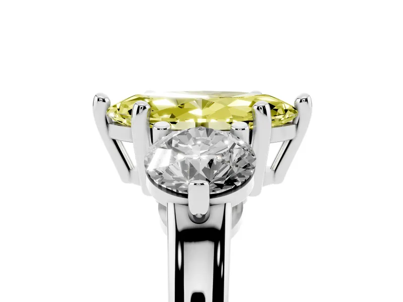 Fancy Yellow Marquise Cut Diamond Three-Stone Ring Set in Platinum with Prong Setting and Classic Band