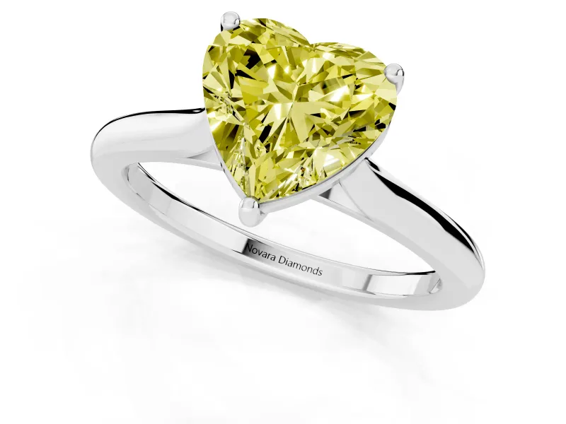 Fancy Yellow Heart Cut Diamond Solitaire Ring Set in Silver with Cathedral Band and Prong Setting