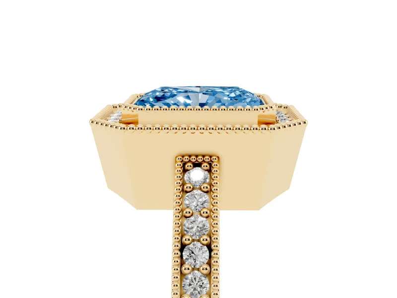 Fancy Blue Radiant Cut Diamond Halo Engagement Ring Set in Yellow gold with Pavé Band and Round Halo Stones