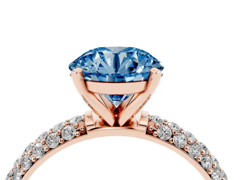 Fancy Blue Round Cut Diamond Solitaire Ring Set in Rose gold with Prong Setting and Pavé-Set Band
