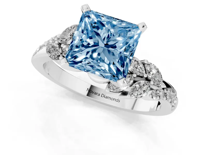 Fancy Blue Princess Cut Diamond Solitaire Ring Set in White gold with Marquise Twist Band and Prong Setting