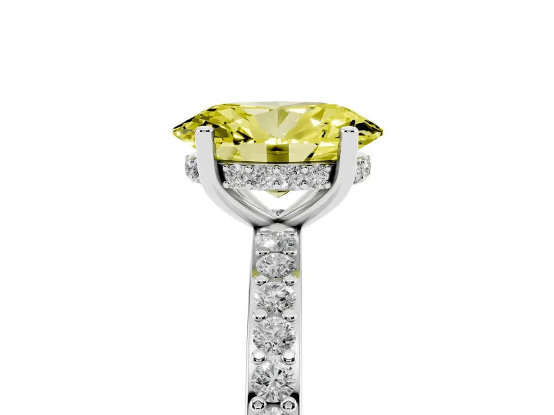 Fancy Yellow Oval Cut Diamond Pavé Band Ring Set in White gold with Prong-Set Center Stone