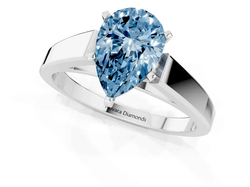 Fancy Blue Pear Cut Diamond Solitaire Engagement Ring Set in White gold with Prong Setting and Tapered Band