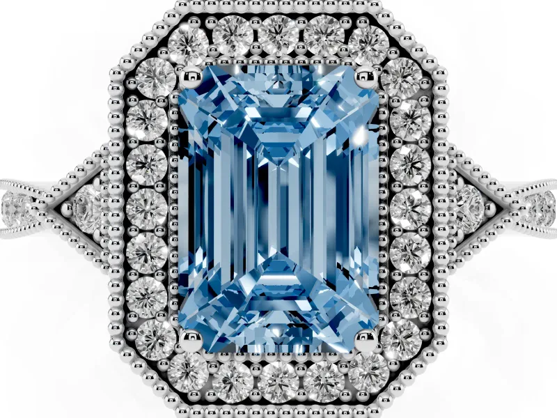 Fancy Blue Emerald Cut Diamond Halo Engagement Ring Set in White gold with Milgrain Pavé Band