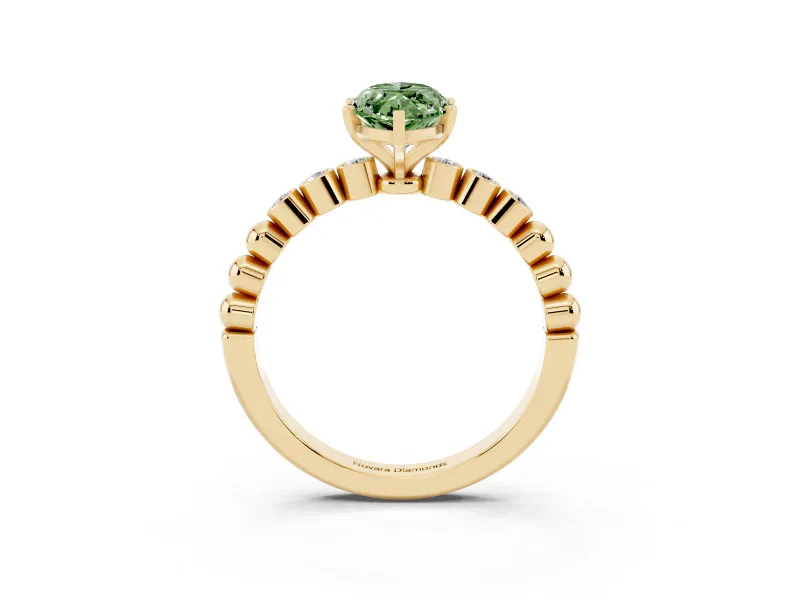 Fancy Green Marquise Cut Diamond Solitaire Engagement Ring Set in Yellow gold with Bezel Accents on Beaded Band