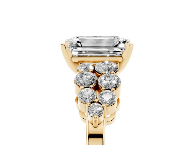 Emerald Cut Diamond Cluster Engagement Ring Set in Yellow gold with Pavé Band and Prong Setting