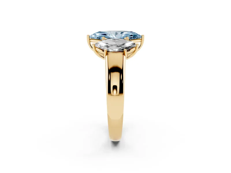 Fancy Blue Three-Stone Marquise Cut Diamond Ring Set in Yellow gold with Matching Prong Settings and Plain Band