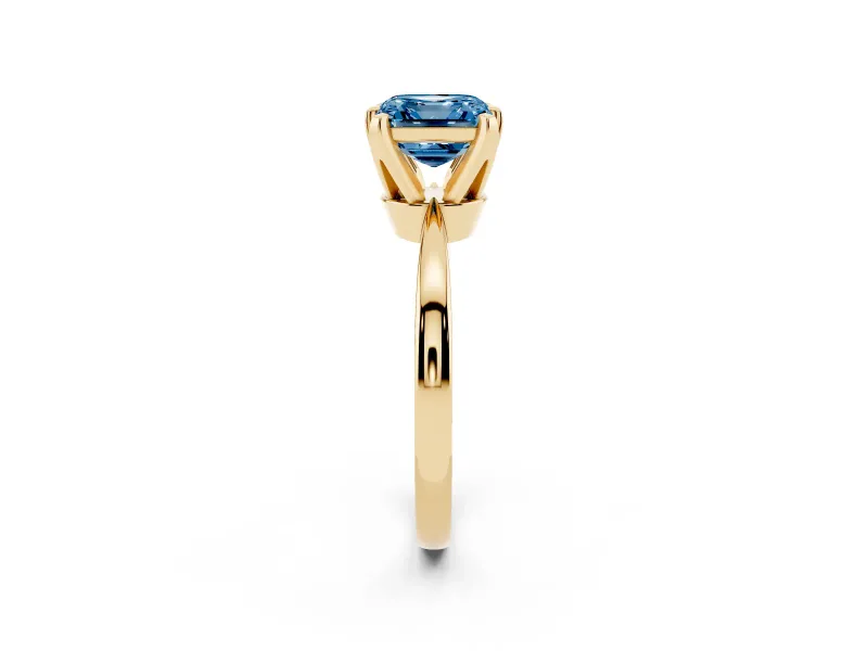 Fancy Blue Asscher Cut Diamond Solitaire Engagement Ring Set in Yellow gold with Slim Tapered Solitaire Band