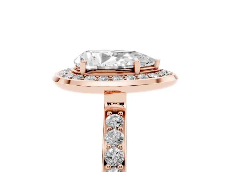 Pear Cut Diamond Halo Ring Set in Rose gold with Bezel Frame and Pavé Band