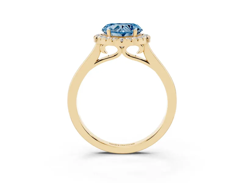 Fancy Blue Heart Cut Halo Round Diamond Solitaire Ring Set in Yellow gold with Pavé Band and Prong Setting