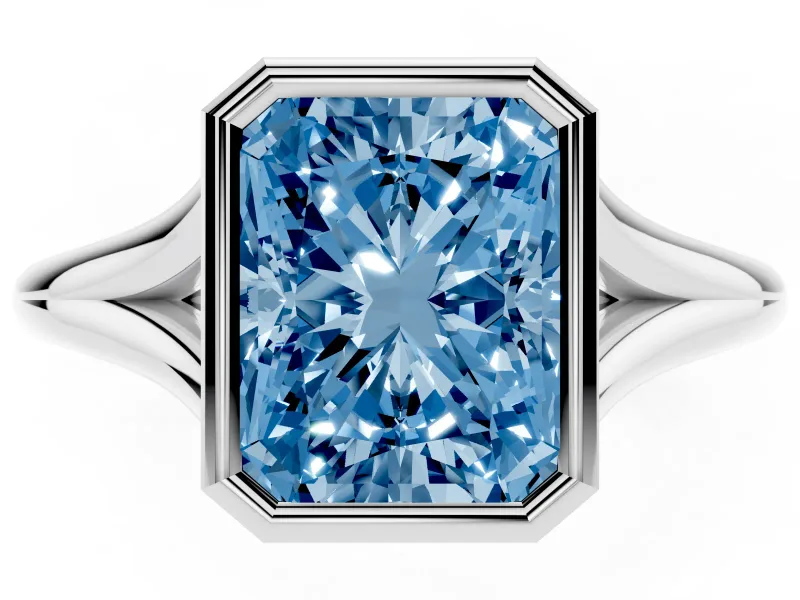 Fancy Blue Bezel Set Radiant Cut Diamond Solitaire Ring Set in Platinum with Tapered Band