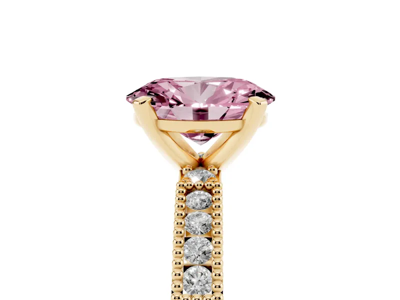 Fancy Pink Oval Cut Diamond Solitaire Ring Set in Yellow gold with Slim Pavé Band and Prong Setting