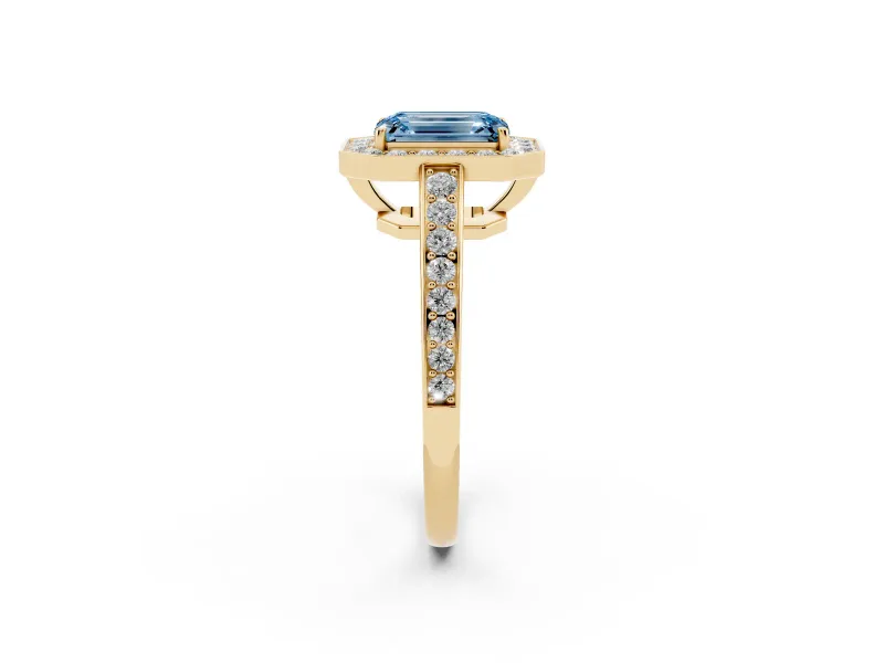 Fancy Blue Emerald Cut Diamond Halo Pavé Engagement Ring Set in Yellow gold with Bezel Setting