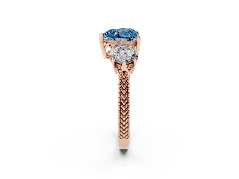 Fancy Blue Heart Cut Diamond Three-Stone Ring Set in Rose gold with Milgrain Band