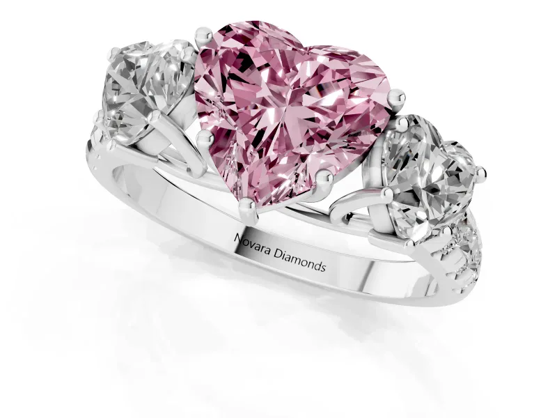 Fancy Pink Heart Cut Diamond Three-Stone Ring Set in Platinum with Pavé Band