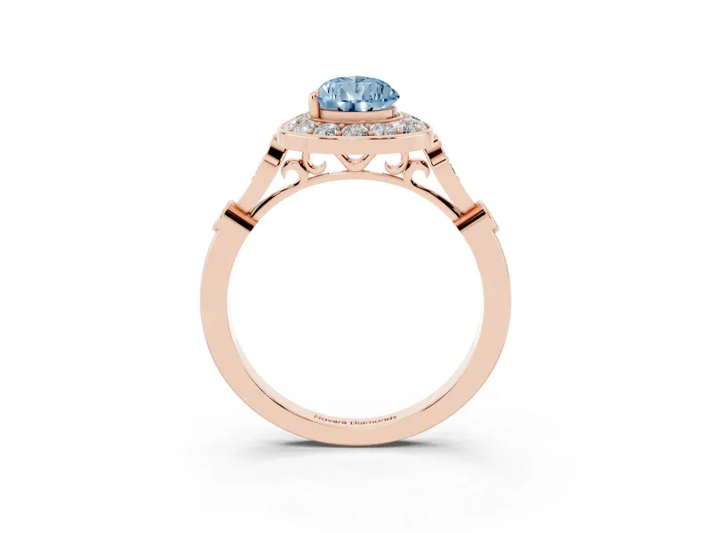 Fancy Blue Pear Cut Diamond Halo Engagement Ring Set in Rose gold with Twisted Band and Prong Setting