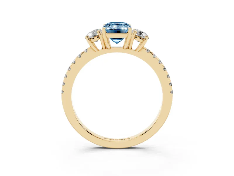 Emerald Cut Three Stone Engagement Ring Setting for a Fancy Blue Lab-Grown Diamond | Pave Shoulders | Yellow Gold