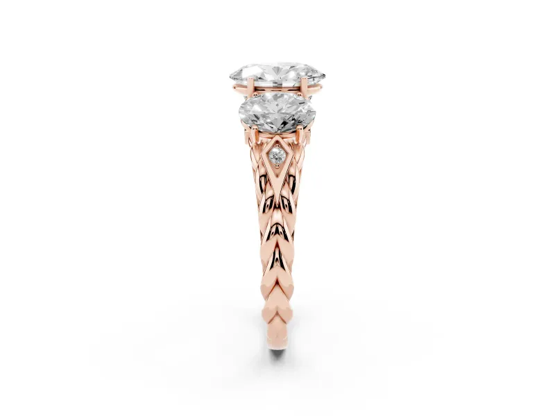 Oval Cut Diamond Three-Stone Ring Set in Rose gold with Braided Band