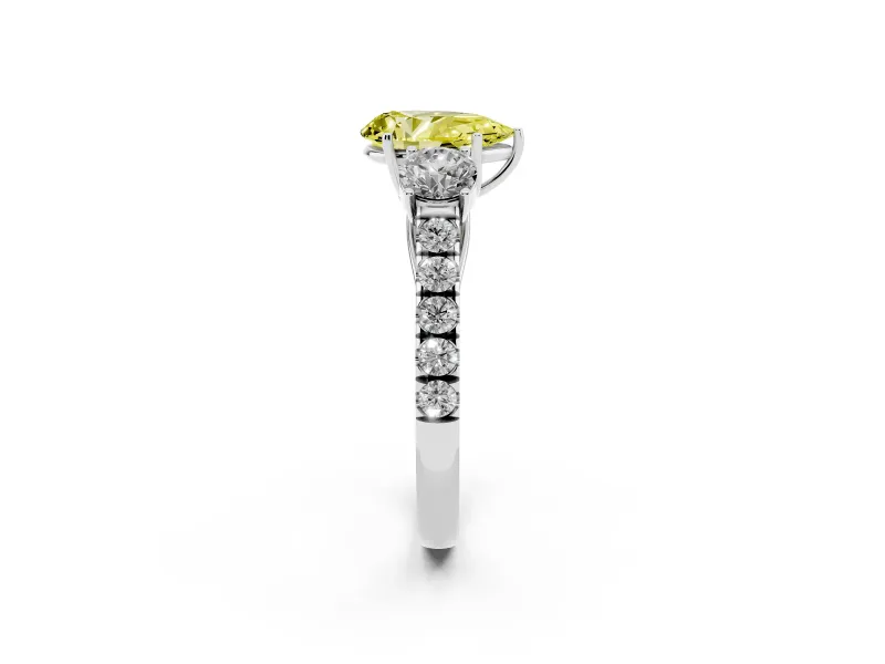 Fancy Yellow Pear Cut Diamond Three-Stone Ring Set in Platinum with Round Side Stones and Delicate Pavé Band