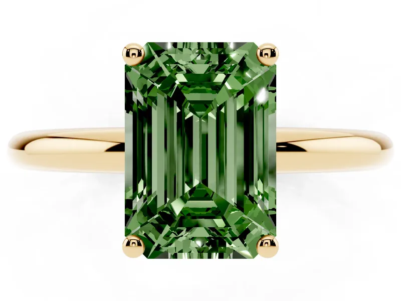 Fancy Green Emerald Cut Diamond Solitaire Engagement Ring Set in Yellow gold with Prong Setting and Polished Band