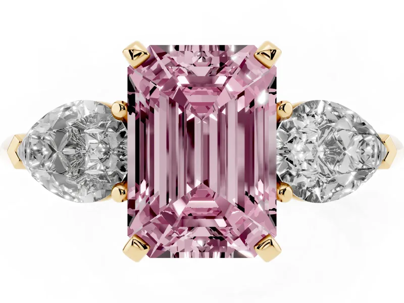 Fancy Pink Three-Stone Emerald Cut Diamond Ring Set in Yellow gold with Pear Side Stones and Prong Setting