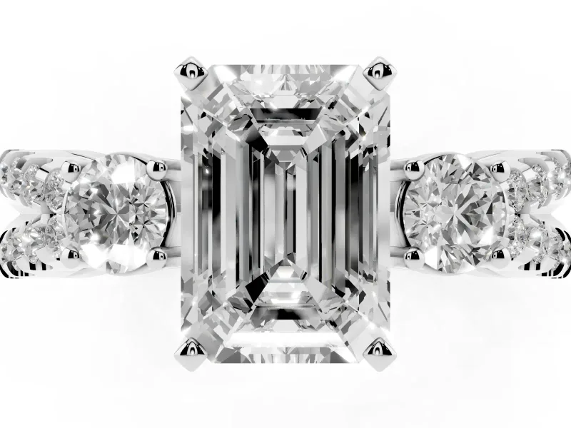 Emerald Cut Diamond Three-Stone Ring Set in Silver with Pavé Split Shank and Prong Setting