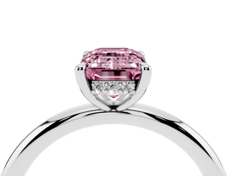 Fancy Pink Emerald Cut Diamond Solitaire Ring Set in White gold with Thin Band and Prong Setting