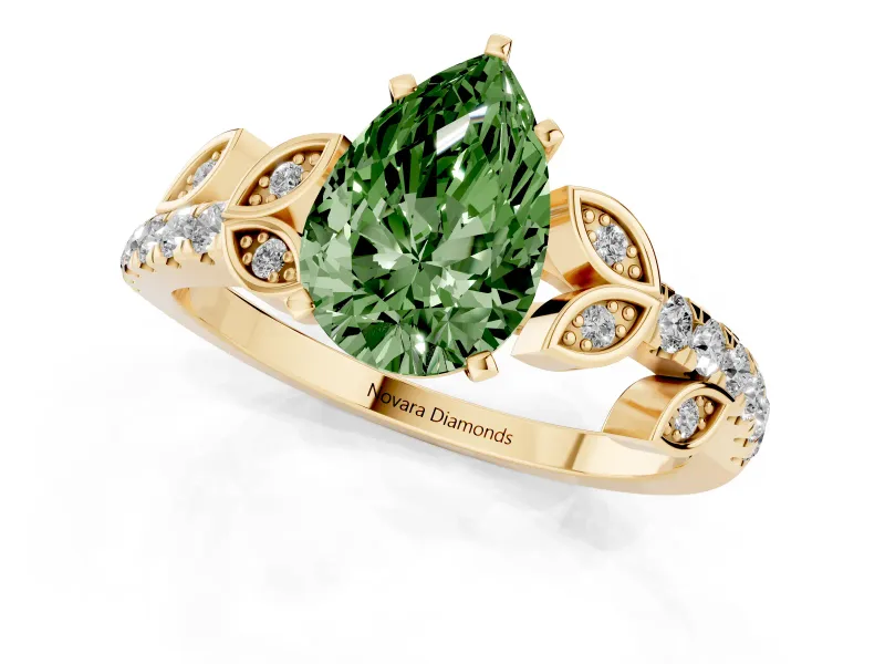 Fancy Green Pear Cut Diamond Solitaire Leaf-Inspired Ring Set in Yellow gold with Pavé Band and Prong Setting