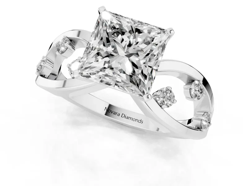 Princess Cut Diamond Solitaire Ring Set in White gold with Side Stones on Criss-Cross Band and Prong Setting