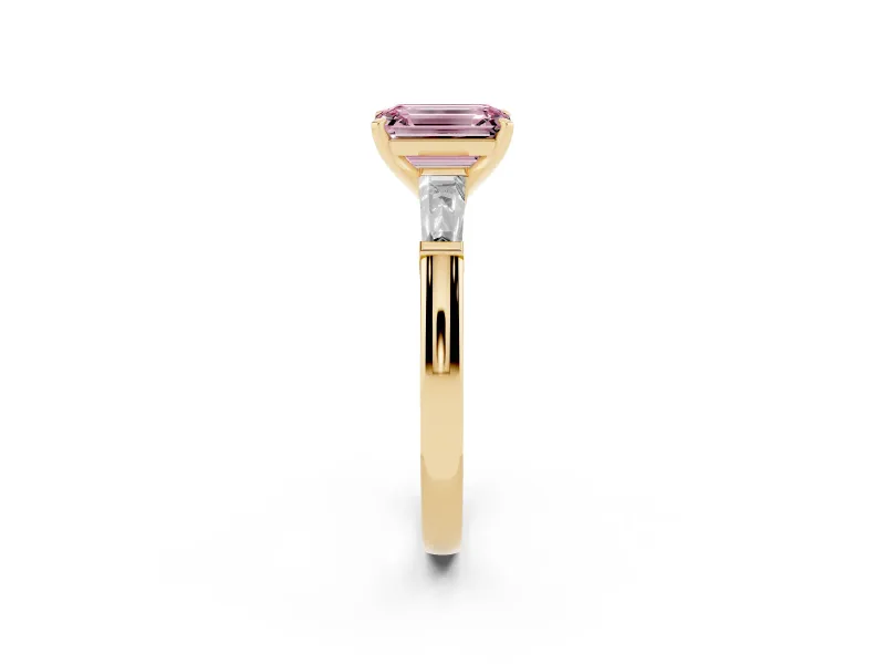 Fancy Pink Emerald Cut Diamond Solitaire Ring Set in Yellow gold with Tapered Baguette Side Stones and Prong Setting