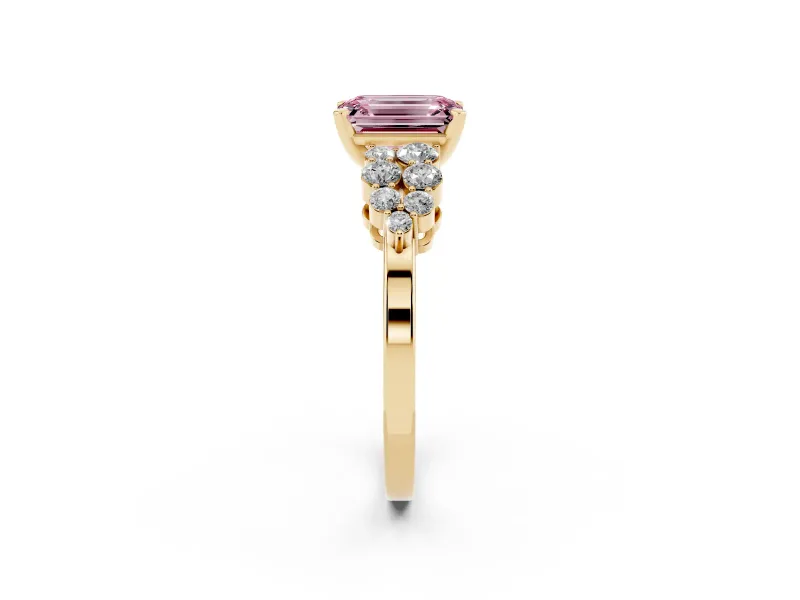 Fancy Pink Emerald Cut Diamond Cluster Engagement Ring Set in Yellow gold with Pavé Band and Prong Setting