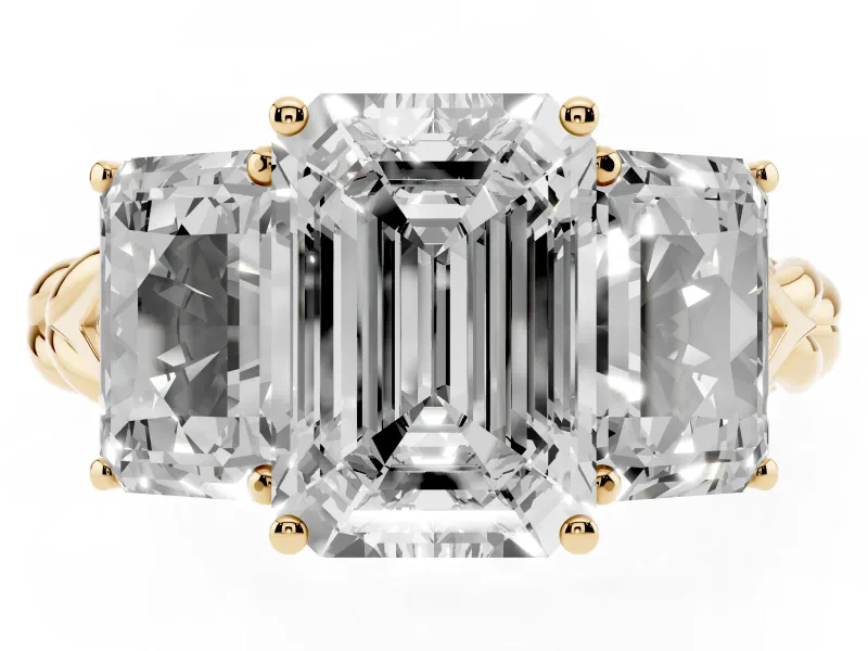 Emerald Cut Diamond Three-Stone Ring Set in Yellow gold with Braided Band